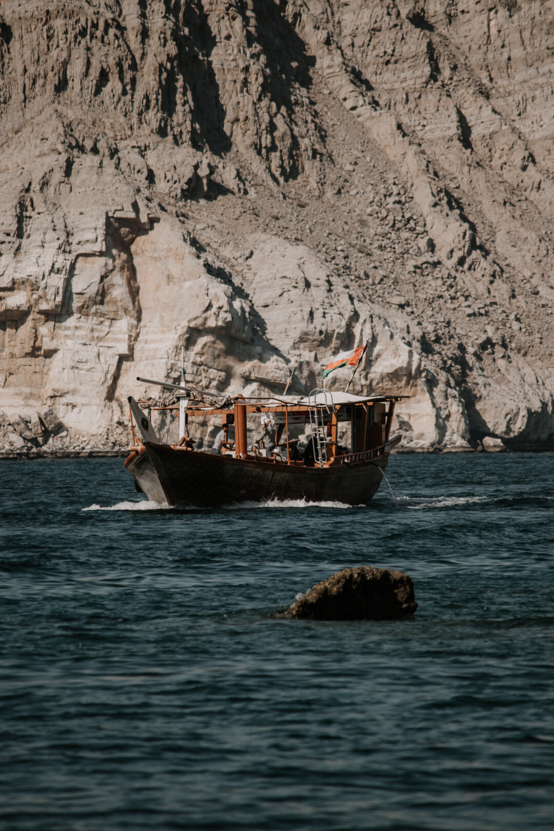 A boat sailing in Musandam