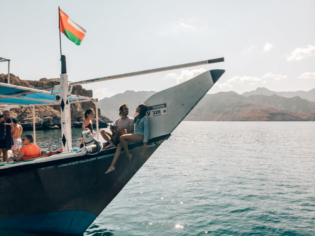 A drone shot of Pili and Dano on the nose of the boat