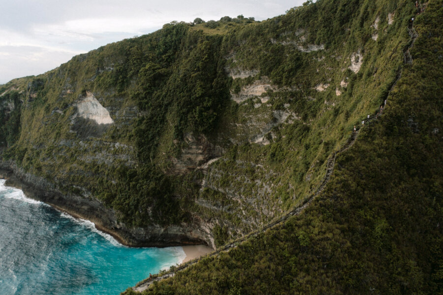 Kelingking beach. Drone shot showing the initial descent with stairs