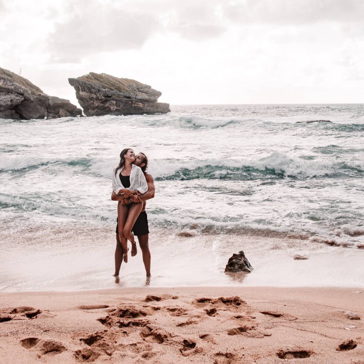 Pili and Dano in Barbados enjoying the beach